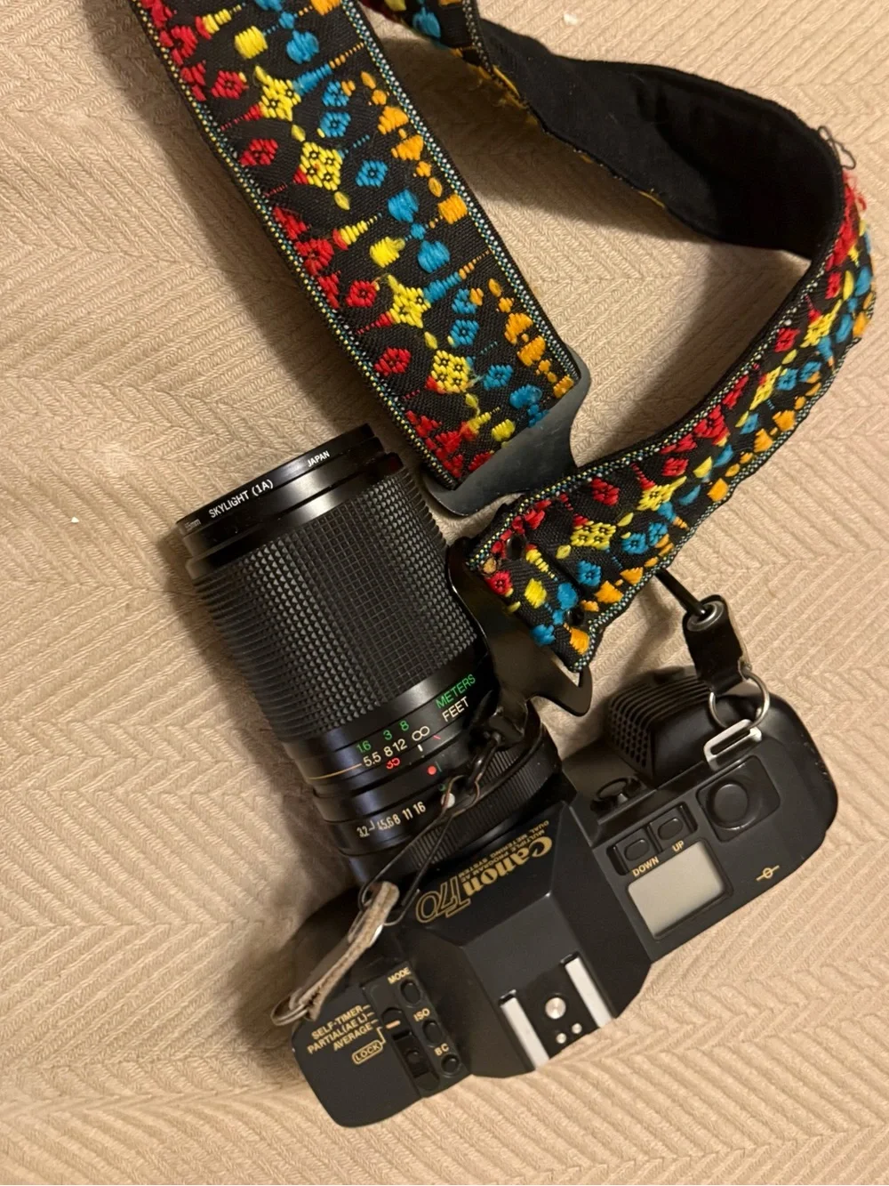 Canon T-70 35mm film camera with 35mm-105mm Zoom Lens with Multicolor Strap